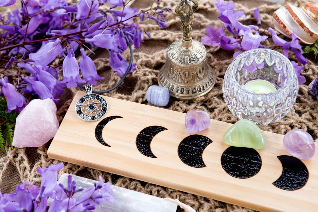 Witch Pagan Moon Phases Altar with crystals and flowers